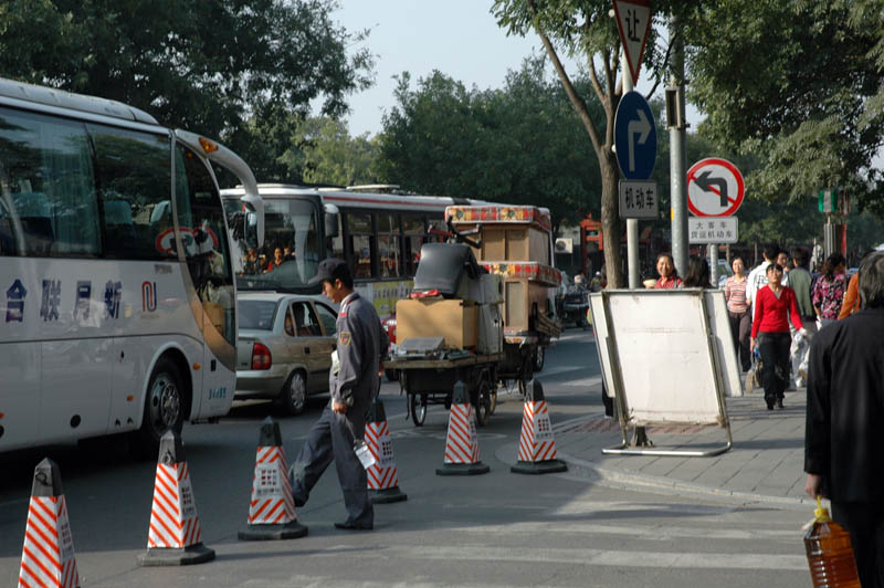 Near Tianamen Square - someone's low budget moving day adds to the traffic chaos